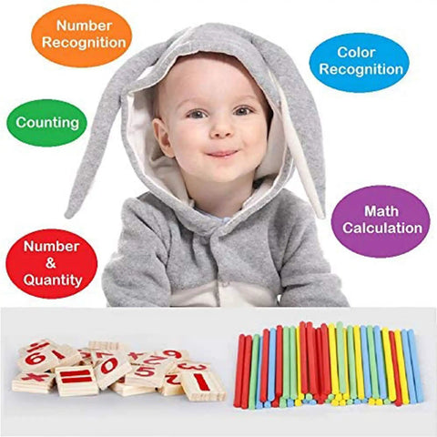 Child in bunny outfit with Counting Number Blocks And Wooden Sticks Kit For Kids Learning Kid Friendly Fun And Easy Way To Boost Math Skills.