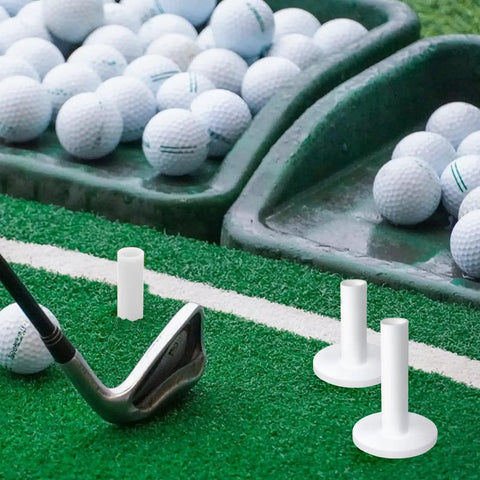 Golf iron near unbreakable rubber golf tees built to last for practice mats and golf simulators, stable driving range tees