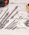 Six Piece M8x65mm Double Ended Stud Screws Set in 304 Stainless Steel with Nuts and Washers on a wooden backdrop