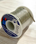 Sun And Moon 60 40 Solder For Stained Glass Pro Grade Bulk Pack Five 1Lb Rolls And Two Chemical Brushes on a wooden table