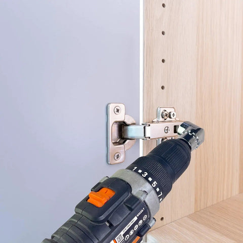 Flexible Drill Bit Extension and 105 Degree Right Angle Drill Adapters Kit installing a hinge in a tight cabinet corner.
