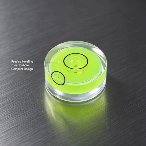 4Pcs Small Circular Bubble Levels, Double Sided Adhesive Bottom Mini with clear bubble view on a surface.