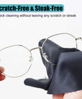 Front view of round metal eyeglasses with navy microfiber cleaning cloth on a keychain
