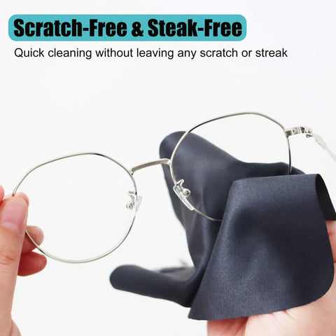Front view of round metal eyeglasses with navy microfiber cleaning cloth on a keychain