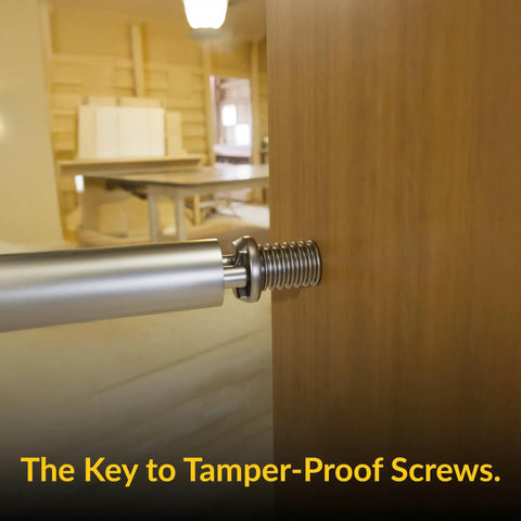 No Sweat One Way Screw Remover Tool For Tamper Resistant Screws, stainless steel tip inserted in wooden surface