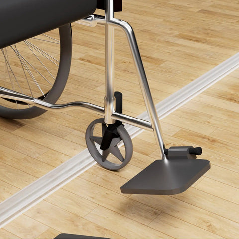 39 Inch Shatterproof Snap Together Shower Threshold Water Dam And Sink Splash Guard Flexible Porous Barrier installed near wheelchair.