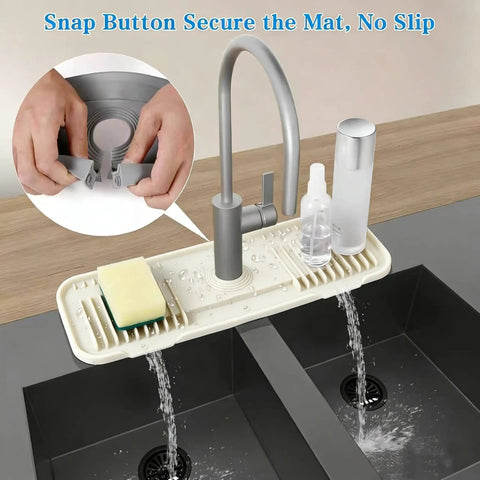 2nd Generation Silicone Faucet Mat, Kitchen Silicone Faucet Drip Catcher with Cuttable Circular Central for Kitchen Sink, Tailor-Made for Faucets with Deck Plate【Beige】 shown securing with snap button and water dripping.