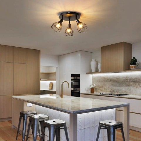 Three Light Ceiling Mount Kitchen Fixture With Multi Directional Rotating Black Iron Lamp Shades For Farmhouse Style Kitchens Dining Rooms Porches And Hallways E12 Bulb Not Included illuminating a modern kitchen setting.