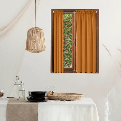 Heavy Duty Swivel Sash Curtain Rods 21 To 38 Inch Telescopic Set Of 2 with orange curtains in a window setting.
