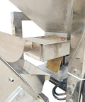 Close-up of Heavy Duty Bucket Elevator Material Conveyor With 220V Single Phase Motor showing stainless steel construction and feeding system.