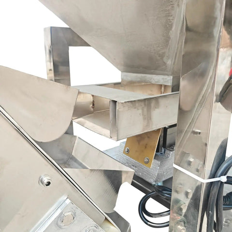 Close-up of Heavy Duty Bucket Elevator Material Conveyor With 220V Single Phase Motor showing stainless steel construction and feeding system.