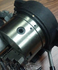 Close-up of Six Inch Precision Machine Spacer With Adjustable Chuck, showing masking plates and five minute vernier scale.