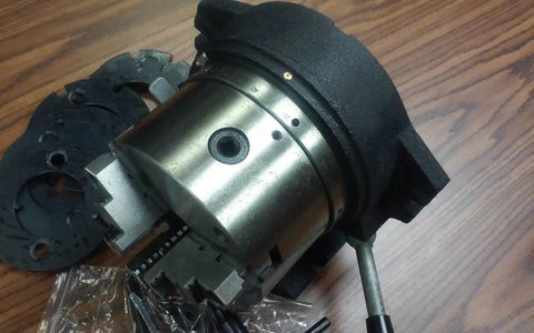 Close-up of Six Inch Precision Machine Spacer With Adjustable Chuck, showing masking plates and five minute vernier scale.