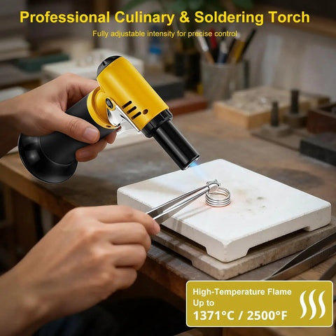 Slick Butane Torch With Clear Fuel Gauge And Adjustable Flame For Dead Simple One Hand Kitchen Cooking And Sick Flames Backyard Grilling Creme Brulee Finish Plus Craft Soldering Gear in use with a ring.