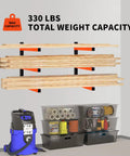 Three Layer Wall Mounted Storage Rack For Long Items Like Lumber And Pipes Heavy Duty Garage Shed Shelving Black Two Pack Scratch Resistant Space Saving Organizer shown holding lumber