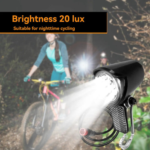 Ultra Bright Led Bike Front Light 20 lux illumination in night riding scenario with cyclist, waterproof design, 15 inch cable