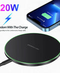 20W Fast Wireless Charging Pad For iPhone 17 16 15 14 13 12 SE AirPods Samsung Galaxy S25 S24 Note Pixel And LG Slim Qi Charger Mat With Case Friendly Design And Overheat Protection, showing black circular pad with phone charging.