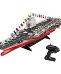 Heavy Duty RC Aircraft Carrier Boat With 2 4 GHz Dual Motors, colorful flags, aircraft on deck, with remote control.