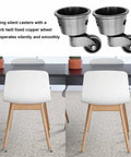 Two Pack Vintage Zinc Alloy Swivel Caster Wheels With Antique Green Bronze Finish under white chairs on carpet