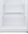 Interior view of Stay Frosty With This Hella Reliable 17 Cubic Foot Upright Convertible Fridge Freezer showing four adjustable wire shelves.
