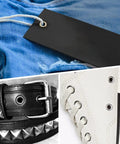 Close-up of 1/8 inch ID brass grommets eyelets kit for canvas, clothes, leather on denim, belt, and shoe