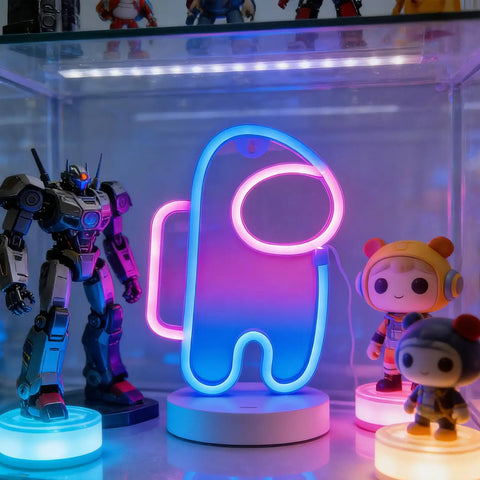 Lit Alien Neon Sign Light Astronaut LED Decor with USB or Battery Power on shelf with toys, blue-pink glow.