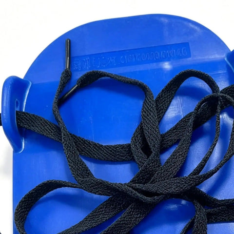 Close-up of Heavy Duty Lawn Aerator Shoes with blue sole and black adjustable straps for outdoor yard maintenance.