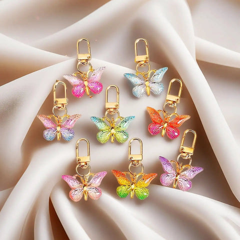 Super Vibrant Sixty Piece Zinc Alloy Keychain Clips With Swivel Lobster Claw Clasps featuring colorful butterfly designs on clips.