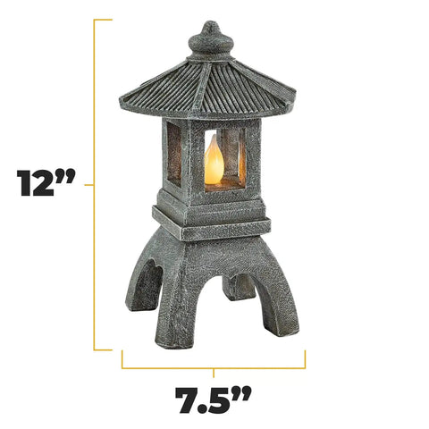 Tranquil Pagoda Solar Garden Statue With Flickering Led Lantern Outdoor Japanese Zen Decor Water Safe Polyresin Yard Light Day To Night Glow For Lawn Pathway Serene Backyard Accent That Shines Brightly, 12 inches tall and 7.5 inches wide.