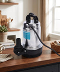 Cordless Submersible Water Pump 1003 GPH High Flow Battery Operated Drain Pump For Garden Irrigation And Rain Barrel Transfer No Strings Attached Ease sleek metal design on wooden countertop with plants.
