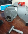 Heavy Duty Hydraulic Torque Wrench 1.5 Inch Drive with swivel head and hose, made for rig crews and mechanics.