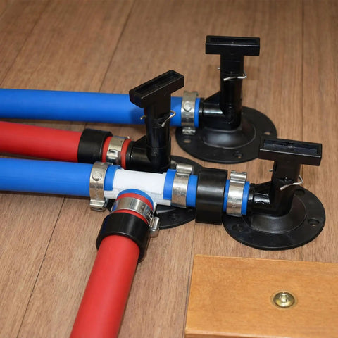2 Pack Half Inch PEX RV Low Point Drain Valve 90 Degree Space Saving Water Line Fitting Durable Plastic Pipe Connector, black and installed on wooden surface.