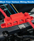 Heavy Duty 12V Bus Bar Power Distribution Block 250A mounted on engine with red wires connected for automotive wiring setup.