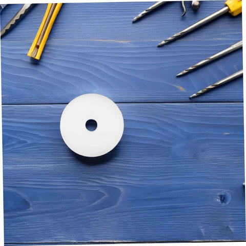 Effortless Swap 5 Pack Nylon Guided Pulley Wheels For Whisper Quiet Glide On Industrial Manure Tracks Patio Doors And Heavy Duty Carts Built Like A Tank, single white nylon wheel on blue wood background.