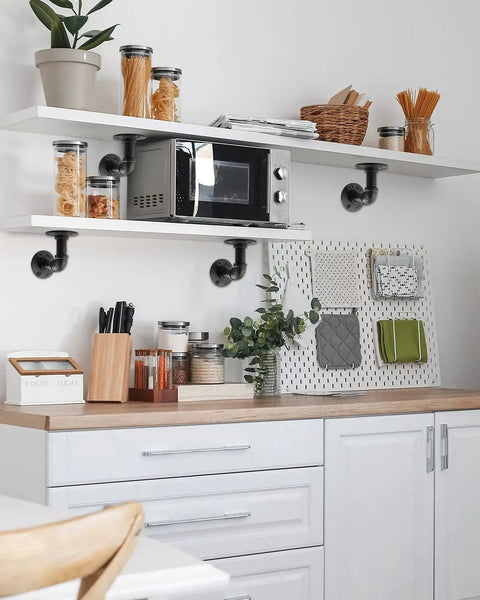 Kitchen shelves secured with Built Tough Pipe Shelf Brackets Set 4 Pack Black L Shaped Iron Shelving Brackets For Shelves Industrial Vintage DIY Pipe Shelf Hardware 4x4 Inch Rustic Farmhouse Mounting Kit, displaying kitchenware and decor.