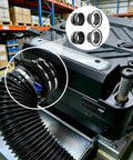 Heavy Duty Magnetic Dust Collection Fittings For 4 Inch Woodwork Shop Vacuums And Tools attached to a shop vacuum's hose.