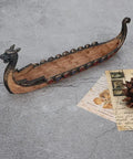 Dragon Motif Resin Incense Burner For Home And Garden Dope Meditation Decor Carving Style With Decorative Function Ideal For Yoga Studio Or Relaxing Chinese Festival Gift, wooden table background.