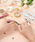 Hands using pliers with DIY Lip Gloss Keychain Craft Kit With Enamel Charms And Chains Pliers Hole Punch Jump Rings Gift Bags