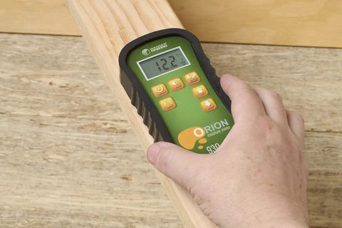 Pinless Wood Moisture Meter With Dual Depth Readings, Non-Damaging Sensor, On-Site Calibration, Pro-Grade Lumber Moisture Measurement For Woodworking, Construction, And DIY Projects on a wood board