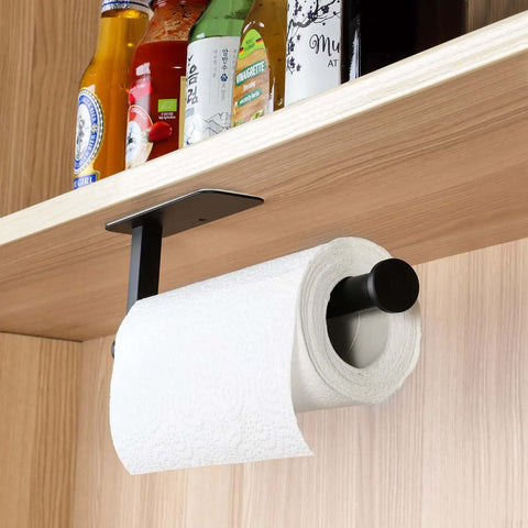 Under-cabinet paper towel holder with self adhesive mount, matte black finish, in kitchen, holding paper towel roll
