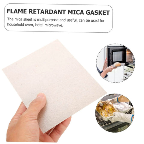Hand holding a beige mica plate sheet for microwave, showcasing heat insulation properties; ideal for household oven and repair kit.