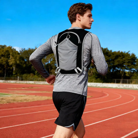 Runner wearing Lightweight Hydration Backpack for Outdoor Adventures with Waterproof Phone Pocket and Multi Pocket Layout
