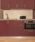 Modern kitchen with burgundy cabinets featuring 10 Pack 3 Inch Champagne Bronze Cabinet Handles For Kitchen Bathroom Dresser And Closet Cabinets Solid Zinc Alloy Construction With Durable Finish And Smooth Edges Ideal For Modern Homes And Renovations