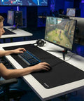 Person using XL Large Gaming Mouse Pad With Ultra Smooth Surface And Non Slip Rubber Base, Washable Desk Mat, 31.5x11.8 Inch on desk