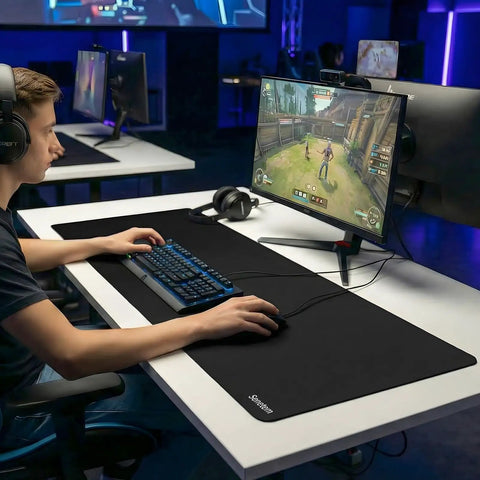 Person using XL Large Gaming Mouse Pad With Ultra Smooth Surface And Non Slip Rubber Base, Washable Desk Mat, 31.5x11.8 Inch on desk