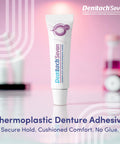Tube of Thermoplastic Denture Adhesive That Doubles As Cushion And Reliner For All Day Hold Up To 7 Days No Slip Grip, on table.