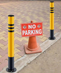 Rock Solid Galvanized Steel Parking Bollards With Concrete Anchors 29.5 X 3 Inch Heavy Duty Safety Posts near a no parking sign.
