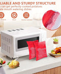 Two Pack Microwave Potato Bags Reusable Baked Potato Pouches Red For Potatoes Corn On The Cob Bread And More Durable High Heat Kitchen Must Have Quick Even Heating For Fast Dinners next to a microwave on a kitchen counter