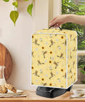 Slick Hummingbird Floral Coffee Maker Cover on a black coffee machine, features waterproof polyester and heavy-duty handle.