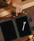 Dang Tough Portable Waterproof Plastic Toolbox With Rugged Latches For Nails Screws And Small Parts Doubles As Electrician Kit Case Mechanics Organizer And Pickup Truck Storage, open with wrench inside.